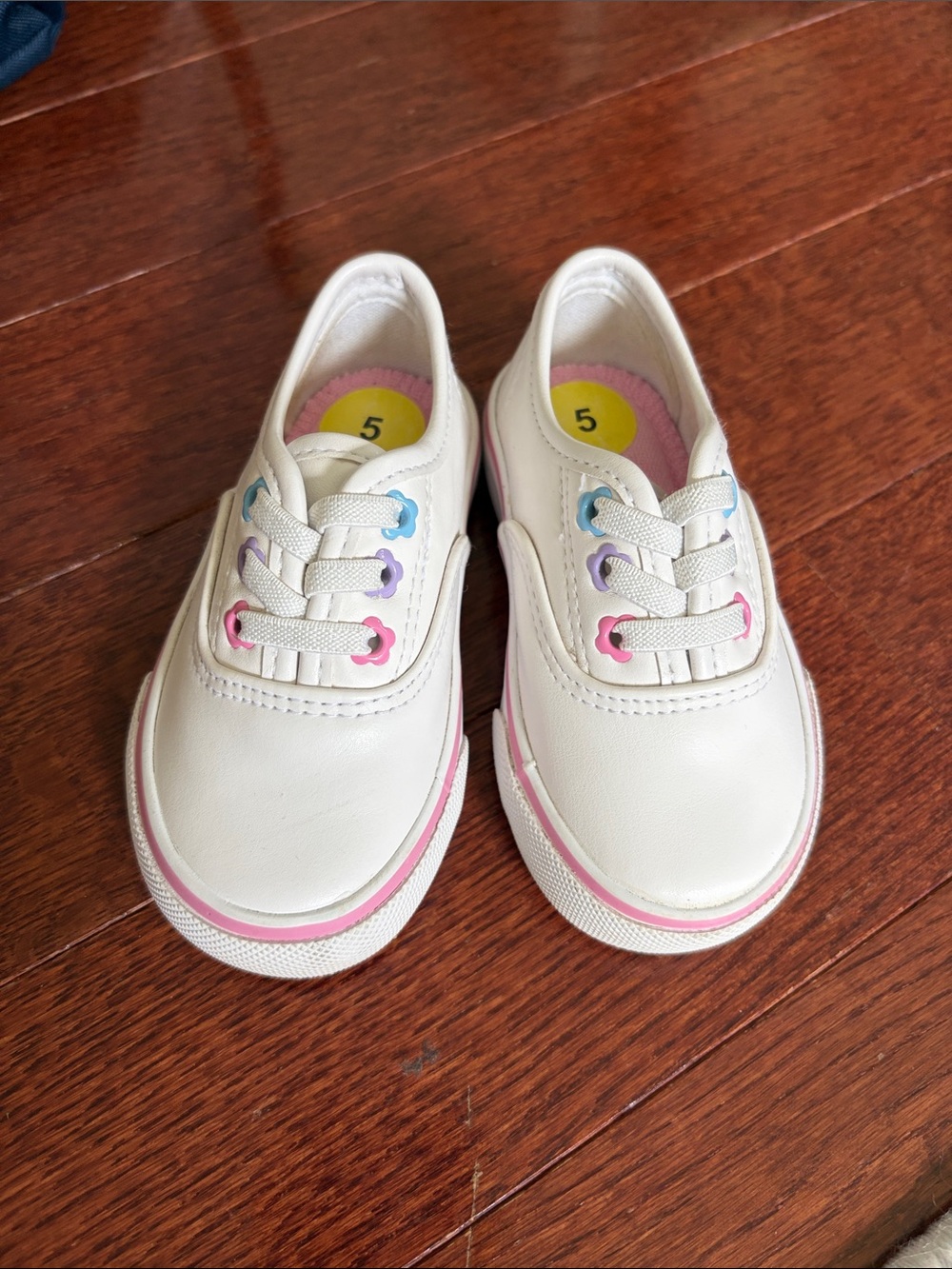 NWOT baby White Canvas Slip-on Sneakers with Pink Accent, size 5